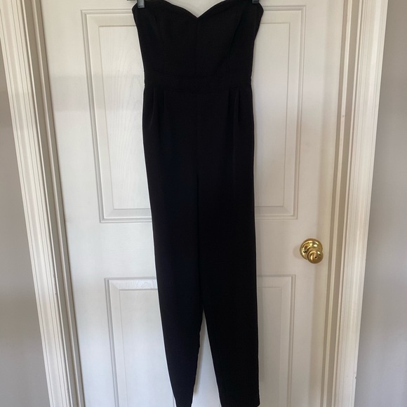 Sparkle & Fade Pants - Black strapless jumper with pockets, size 0.